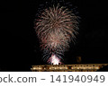 Fireworks blooming in the summer night sky 141940949