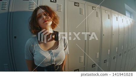 Romantic Mood of Teenage Girl Standing in Hallway Romantic Mood of Teenage Girl Standing in Hallway 141941028