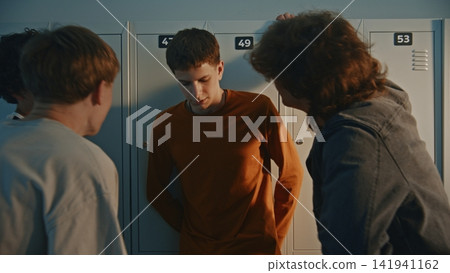 Aggressive Teenagers Mocking and Recording Physical Bullying on Smartphone Aggressive Teenagers Mocking and Recording Physical Bullying on Smartphone 141941162