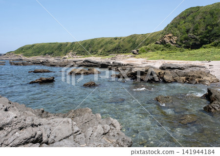 A view of the rocky shore of Jogashima Island in Miura City, Kanagawa Prefecture. A view of the rocky shore of Jogashima Island in Miura City, Kanagawa Prefecture. 141944184