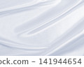 Smooth elegant grey silk or satin luxury cloth as wedding background. Luxurious background design 141944654