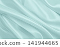 Smooth elegant blue silk or satin luxury cloth texture as abstract background. Luxurious background design 141944665