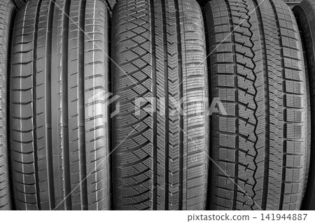 Summer, All-Season and Winter Car Tire Treads Showing Different Patterns and Designs Side by Side Summer, All-Season and Winter Car Tire Treads Showing Different Patterns and Designs Side by Side 141944887