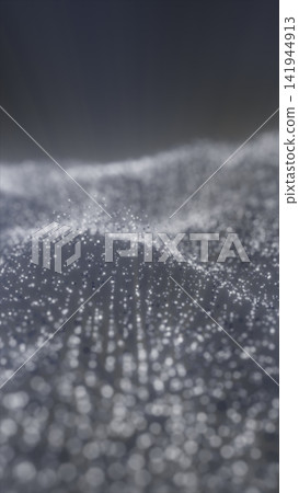 Monochrome particle landscape with glowing white dots and soft blurred terrain, suggesting digital data fields and futuristic abstract space. Monochrome particle landscape with glowing white dots and soft blurred terrain, suggesting digital data fields and futuristic abstract space. 141944913
