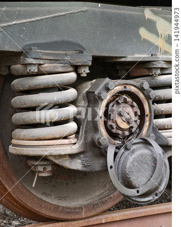 Freight wagon bogie with bearing wheel and spring suspension illustrating railway engineering and transportation technology Freight wagon bogie with bearing wheel and spring suspension illustrating railway engineering and transportation technology 141944973