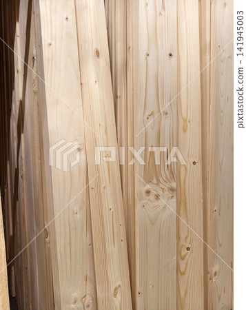 Wooden boards for sale on supermarket racks indoors Wooden boards for sale on supermarket racks indoors 141945003