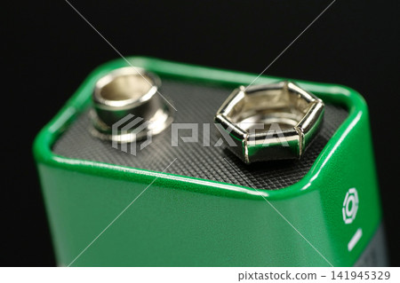 9V battery with connectors in simple composition, electric battery providing nominal 9 volts and ready to supply energy to electronics 9V battery with connectors in simple composition, electric battery providing nominal 9 volts and ready to supply energy to electronics 141945329