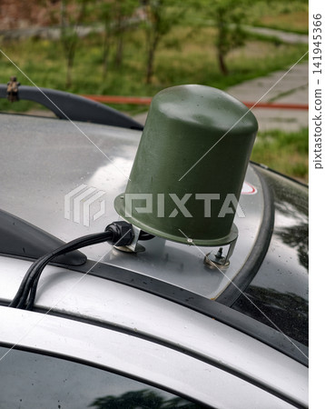 Mobile professional antenna system mounted on car for detecting FPV and other unmanned aircraft. Vehicle mounted high frequency antenna for drone monitoring and electronic countermeasure operations Mobile professional antenna system mounted on car for detecting FPV and other unmanned aircraft. Vehicle mounted high frequency antenna for drone monitoring and electronic countermeasure operations 141945366