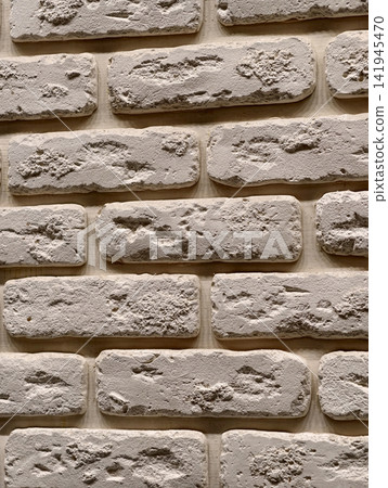 Decorative wall covering panels imitating brick stone and tile finishes arranged in a building store highlighting modern construction and design solutions Decorative wall covering panels imitating brick stone and tile finishes arranged in a building store highlighting modern construction and design solutions 141945470