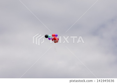 colorful balloons flying in the sky colorful balloons flying in the sky 141945636