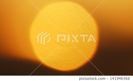 Solar Eclipse, Red Sky and Dramatic Clouds at Sunset Solar Eclipse, Red Sky and Dramatic Clouds at Sunset 141946368