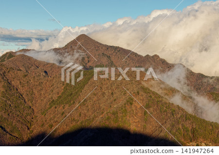 The Misaka Mountains and Mt. Ōdake at sunset, as seen from the Shōjiko Lake Panorama Platform. The Misaka Mountains and Mt. Ōdake at sunset, as seen from the Shōjiko Lake Panorama Platform. 141947264