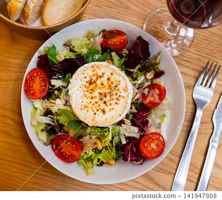 Fresh vegetable salad with goat cheese Fresh vegetable salad with goat cheese 141947808