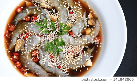 shrimp in soy sauce on white plate, korean style menu shrimp in soy sauce on white plate, korean style menu 141948006
