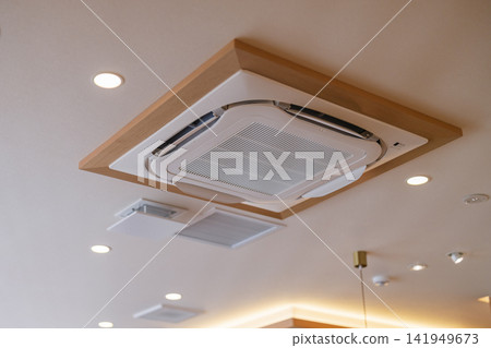 Commercial air conditioner installed on the ceiling Commercial air conditioner installed on the ceiling 141949673