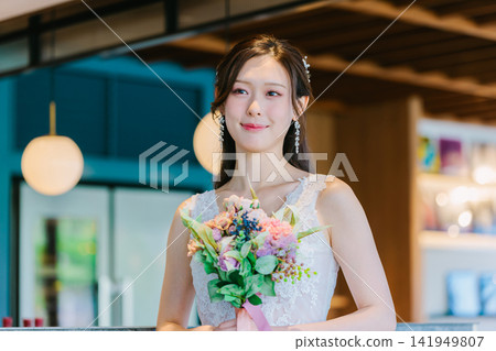 Woman in wedding dress Woman in wedding dress 141949807