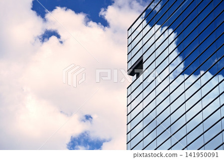 It's so hot! The blue sky reflects off the buildings on this scorching hot day. 141950091