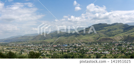Scenic View of a Small Town in a Green Valley 141951025