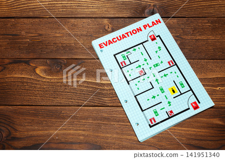 Emergency evacuation plan showing routes and exits for safety measures Emergency evacuation plan showing routes and exits for safety measures 141951340
