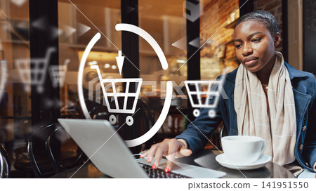 Woman shops online while sitting at a table in a cafe during the day Woman shops online while sitting at a table in a cafe during the day 141951550