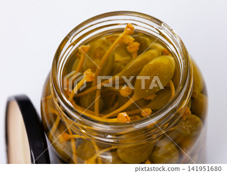 Glass jar with pickled green capers Glass jar with pickled green capers 141951680