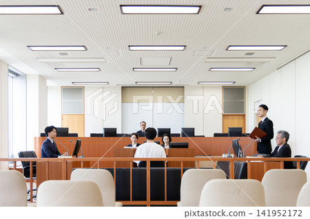 A panoramic view of a trial where witness examinations are taking place in court. A panoramic view of a trial where witness examinations are taking place in court. 141952172