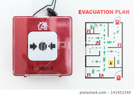 Emergency evacuation plan showing exit routes and alarm Emergency evacuation plan showing exit routes and alarm 141952340