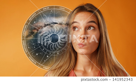 Exploring zodiac signs and their meanings in astrology with a thoughtful young person Exploring zodiac signs and their meanings in astrology with a thoughtful young person 141952343