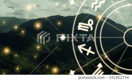 Astrology zodiac signs with mountains and stars in the background during night time Astrology zodiac signs with mountains and stars in the background during night time 141952734