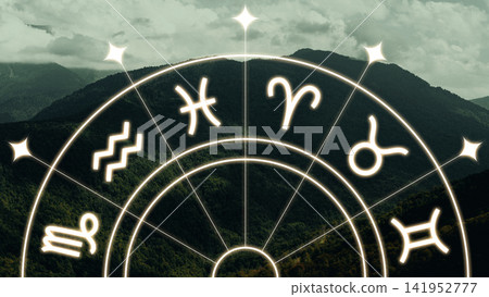 Zodiac signs with mountains and clouds in the background during the day Zodiac signs with mountains and clouds in the background during the day 141952777