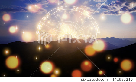 Astrology signs over mountains at sunset with glowing light effects in the sky Astrology signs over mountains at sunset with glowing light effects in the sky 141953216