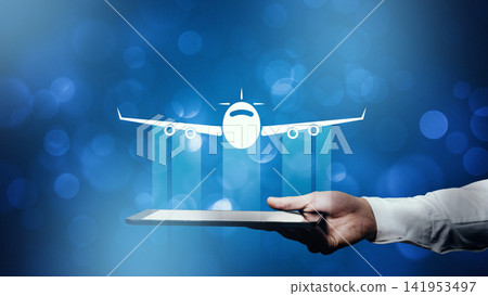 Travel booking process using a tablet with a graphic of an airplane on a blue background Travel booking process using a tablet with a graphic of an airplane on a blue background 141953497