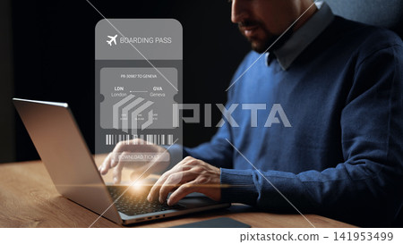 Person books a flight to Geneva from London using a laptop and prepares to download the boarding pass for the trip 141953499