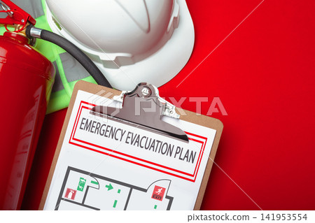 Emergency evacuation plan with safety equipment on a red background Emergency evacuation plan with safety equipment on a red background 141953554