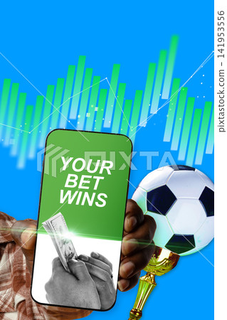 Winning in sports betting with a smartphone showing a successful bet Winning in sports betting with a smartphone showing a successful bet 141953556
