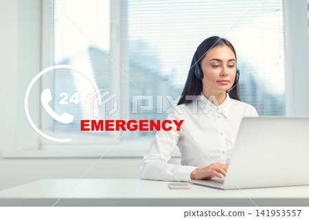 Call center worker assists with emergency services during day at an office Call center worker assists with emergency services during day at an office 141953557