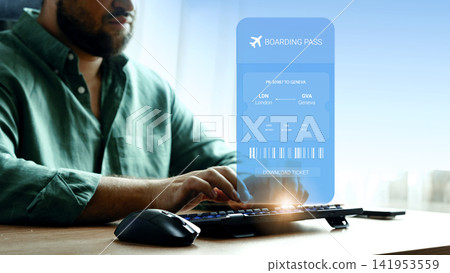 Booking travel online for a flight from London to Geneva with a boarding pass displayed on the screen Booking travel online for a flight from London to Geneva with a boarding pass displayed on the screen 141953559
