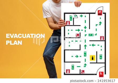 Understanding the emergency evacuation plan for a building with clear exit routes Understanding the emergency evacuation plan for a building with clear exit routes 141953617