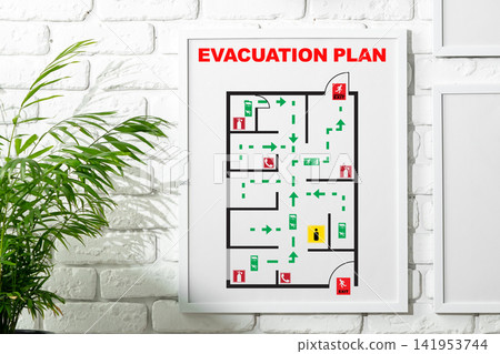 Emergency evacuation plan for a building showing safe routes and exits in case of emergency Emergency evacuation plan for a building showing safe routes and exits in case of emergency 141953744