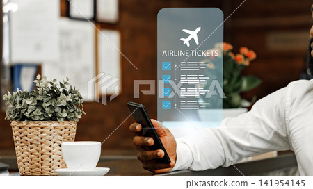 Travel booking process for airline tickets at a cafe with a person using a smartphone Travel booking process for airline tickets at a cafe with a person using a smartphone 141954145