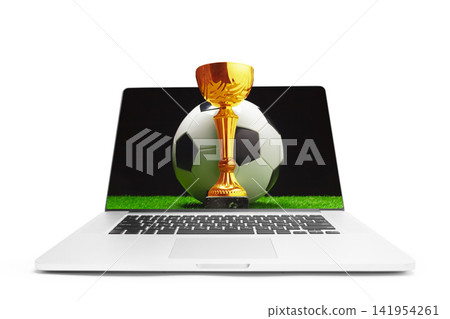 Sports betting on soccer matches with virtual trophy displayed on a laptop screen 141954261
