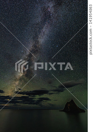 The Perseid meteor shower and Window Rock paint a single streak of light in the summer night sky where the Milky Way shines beautifully. The Perseid meteor shower and Window Rock paint a single streak of light in the summer night sky where the Milky Way shines beautifully. 141954863