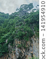 The faith of Buddhists atop a high cliff The faith of Buddhists atop a high cliff: 141954910