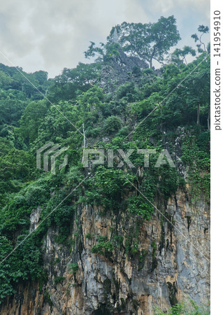 The faith of Buddhists atop a high cliff The faith of Buddhists atop a high cliff: 141954910