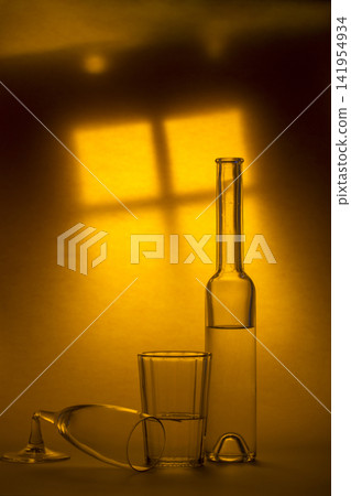 Still life with a bottle, a glass and a broken glass Still life with a bottle, a glass and a broken glass 141954934