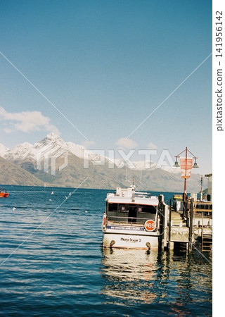 Lakeside and sightseeing cruise ships in Queenstown, New Zealand 141956142