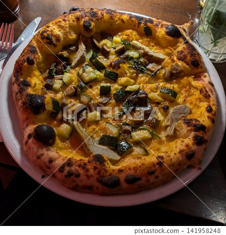 A delicious pizza with a golden crust, melted cheese, and savory toppings. Perfect for food-related designs, menus, or Italian-themed projects, capturing the essence of a classic comfort dish. A delicious pizza with a golden crust, melted cheese, and savory toppings. Perfect for food-related designs, menus, or Italian-themed projects, capturing the essence of a classic comfort dish. 141958248