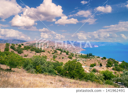 Beautiful mountain coastline. Eastern coast of Crimea Beautiful mountain coastline. Eastern coast of Crimea 141962491