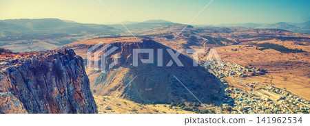 View from Arbel cliff to arab village Wadi al-Hammam, Galilee, Israel View from Arbel cliff to arab village Wadi al-Hammam, Galilee, Israel 141962534