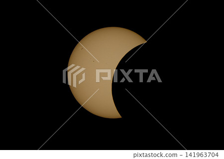 The Moon progressively covers the Sun during the solar eclipse of August 12, 2026, creating a striking crescent-shaped solar disk in the sky. 141963704